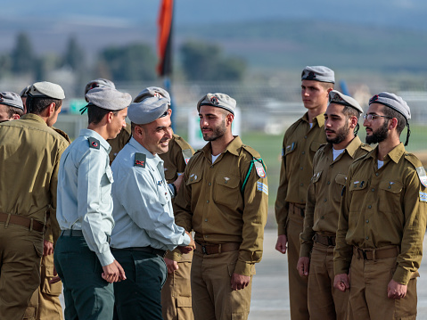 Mishmar David, Israel, Februar 21, 2018 : Officers of the IDF talk with a soldier during the formation in Engineering Corps Fallen Memorial Monument in Mishmar David, Israel