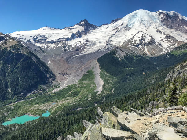 istock Mount Rainier and a turquoise alpine lake 932092492