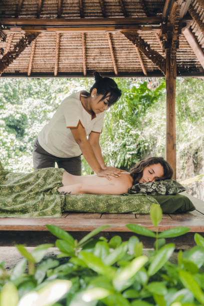 istock Woman receiving  massage in Bali 932096834