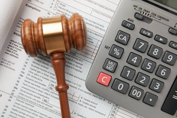 Tax return, gavel and calculator stock photo