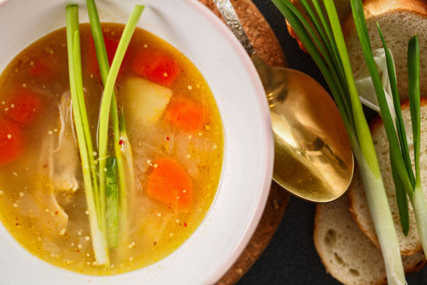 istock homemade chicken soup with green onion 932104534