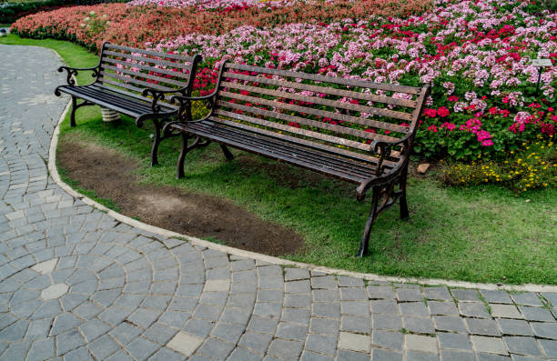 istock Metal bench in the park 932106894