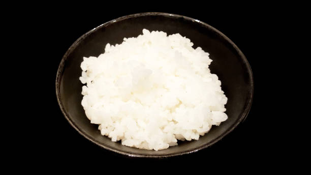 istock close-up traditional japanese rice isolated on background 932107516