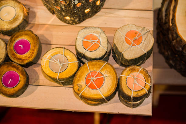 istock Candles on a piece of wood 932108026