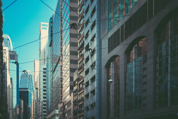 istock Bottom up view of Modern office building in Hong Kong 932108830