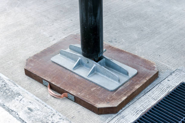 istock ladder fire truck Hydraulic outrigger stabilizing legs extended. 932111762