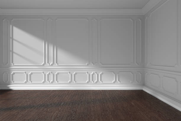 istock White empty room with molding and dark parquet floor 932116950