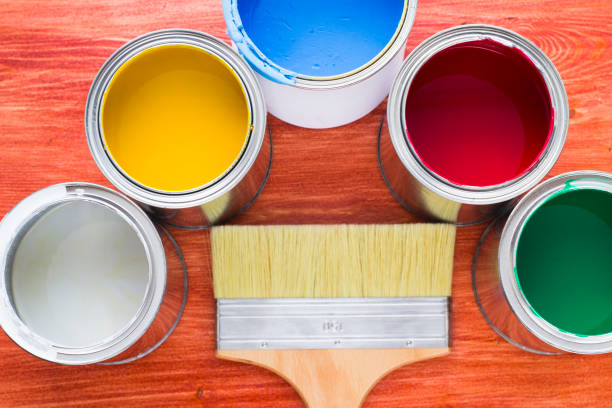 istock House renovation concept, paint cans and brushes 932117288