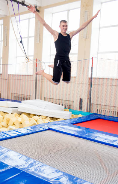 istock Family in trampoline center 932118044