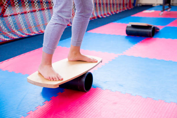 istock Family in trampoline center 932120432