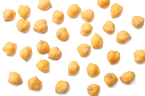 istock chickpeas isolated on white background. top view 932121286