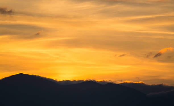 istock Scenic view of a beautiful sunset 932121740