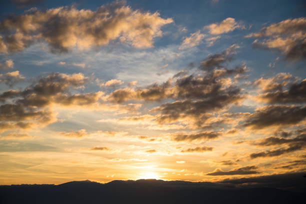 istock Scenic view of a beautiful sunset 932121818
