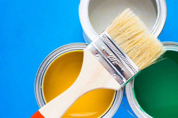 istock House renovation concept, paint cans and brushes 932121836