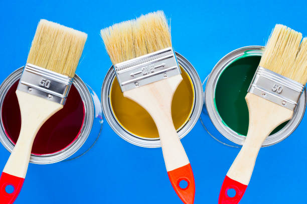 istock House renovation concept, paint cans and brushes 932121872