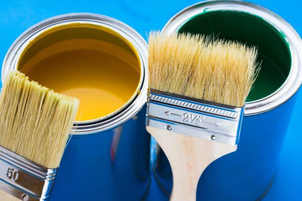 istock House renovation concept, paint cans and brushes 932121944
