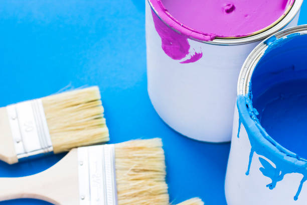 istock House renovation concept, paint cans and brushes 932121994