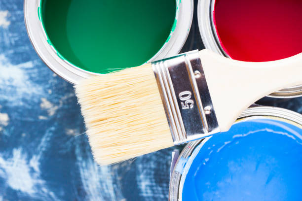 istock House renovation concept, paint cans and brushes 932124632