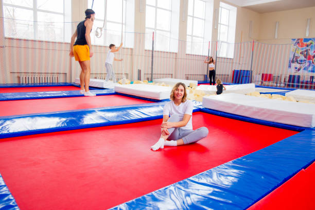 istock Family in trampoline center 932124674