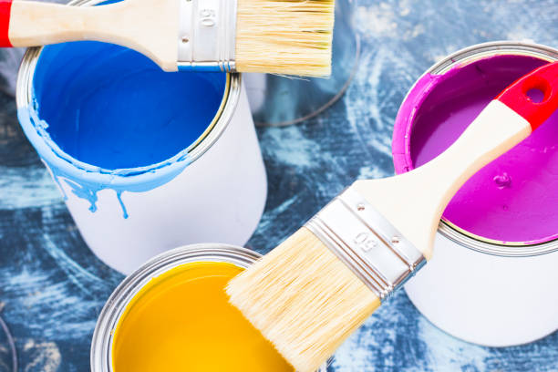 istock House renovation concept, paint cans and brushes 932124826