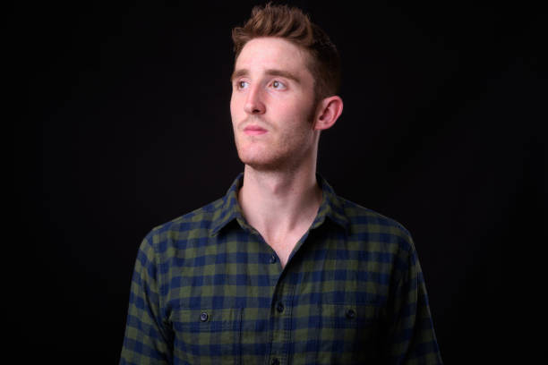 istock Portrait Of Man Thinking 932140592