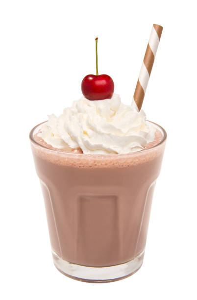 istock vanilla chocolate milkshake with whipped cream and cherry isolated 932141420