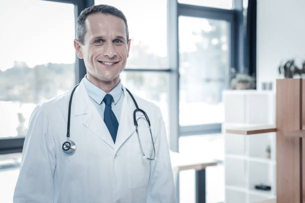 istock Qualified confident doctor feeling good himself and smiling. 932141682