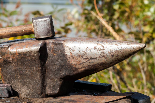 istock medieval historical anvil and hammer 932142322