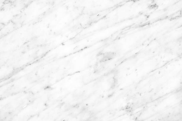 istock White Carrara Marble natural light surface for bathroom or kitchen countertop 932142368