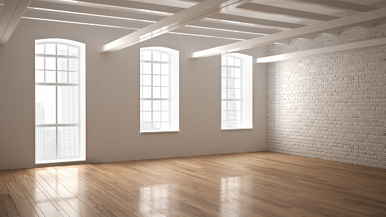 Empty classic industrial space, open room with wooden floor and big windows, modern interior design