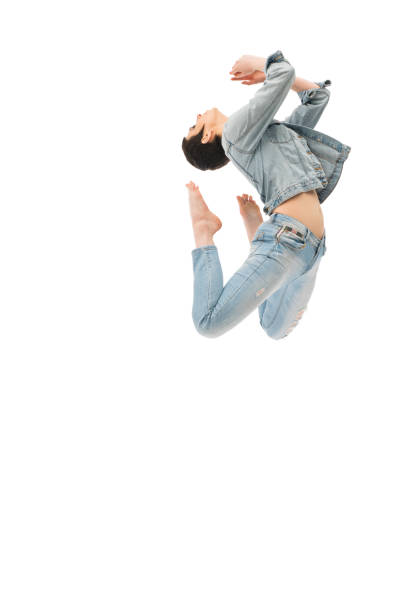 istock Brunette with shot haircut jumping gracefully 932148438