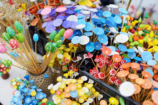 Colorful ceramic flowers sold on Easter market in Vilnius. Annual spring fair hold in March on the streets of capital of Lithuania.