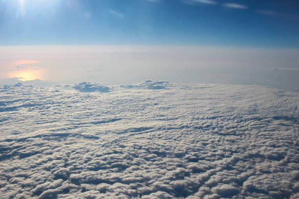 istock View above the earth at the clouds below 932157904