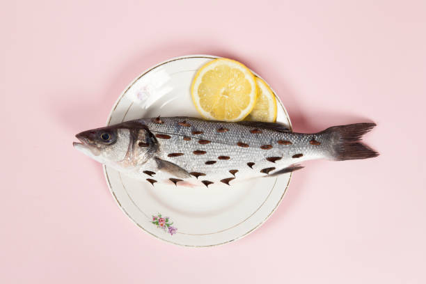 istock lemon fish pink plate rosebush thorns 932165294