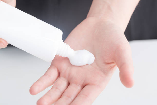istock Woman's hands with care cream 932165338