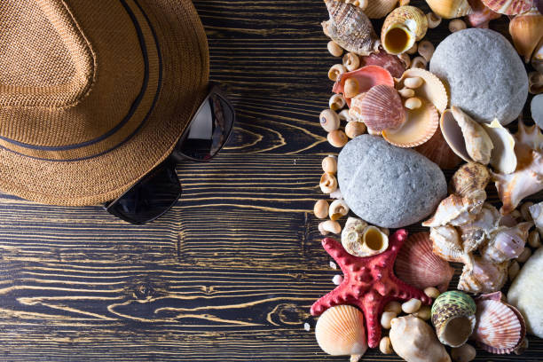 istock Beach accessories on wooden board 932165848
