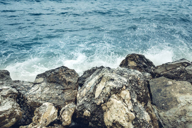 istock Element Strength Concept. Waves Breaking On The Shore With Sea Foam, Close-up. Nature Trevel Adventure 932166424