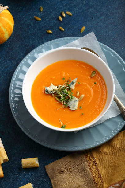 istock Cream soup with cheese, food closeup 932169612