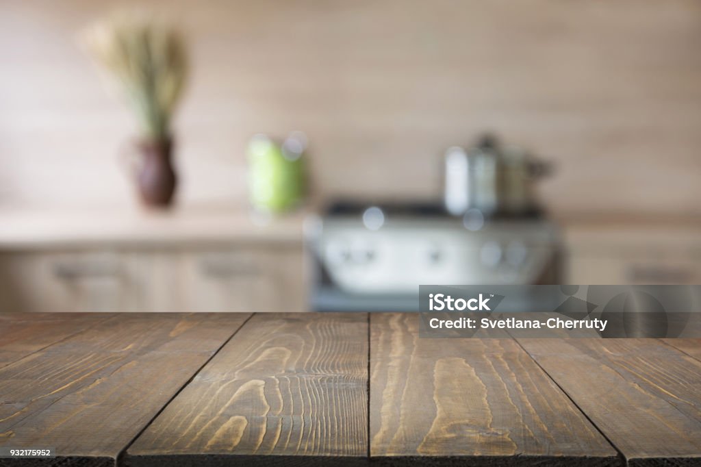 Blurred background. Modern kitchen with tabletop and space for you. Blurred abstract background. Modern kitchen with tabletop and space for you. Kitchen Stock Photo