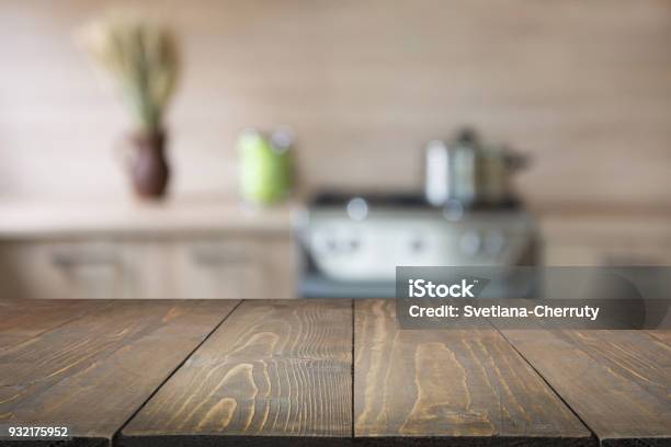 Blurred Background Modern Kitchen With Tabletop And Space For You Stock Photo - Download Image Now