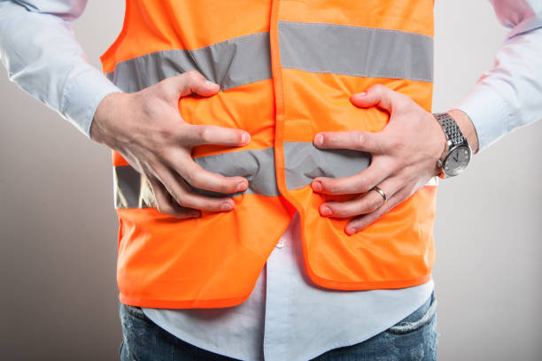 istock Close-up of architect holding belly like hurting 932192276