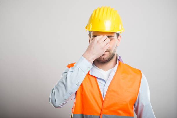 istock Portrait of attractive architect making tired gesture 932192624