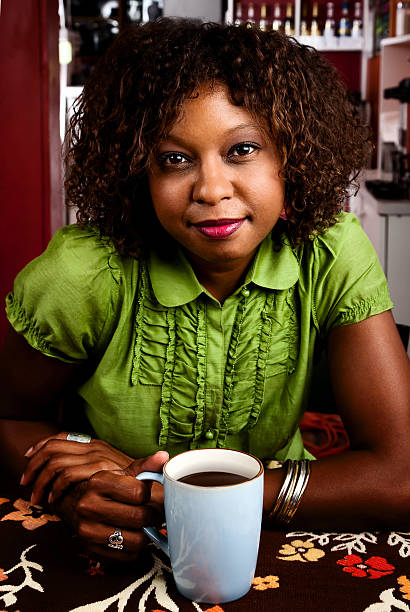 istock Pretty African American Woman with Coffee 93220319