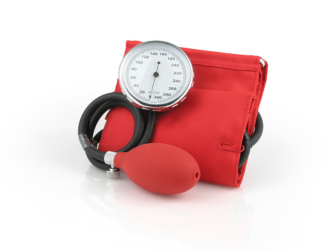 digital blood pressure gauge on white background