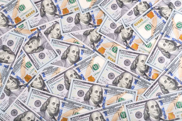 United states of America dollars currency background, new hundred USA money banknotes United states of America dollars currency background, many new one hundred USA money banknotes american one hundred dollar bill photos stock pictures, royalty-free photos & images