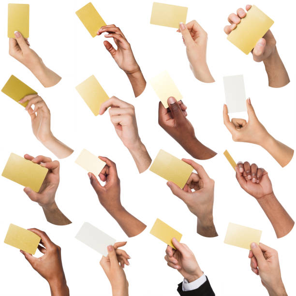 istock Diverse hands with business cards. Set, isolated on white. 932207270