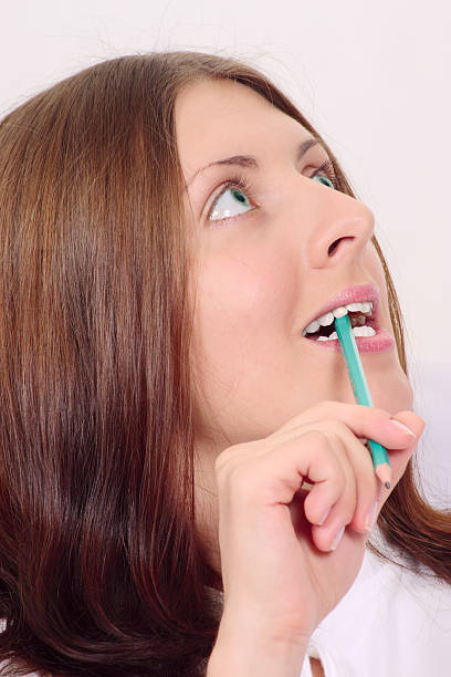 istock The nice girl with a pencil 93220757