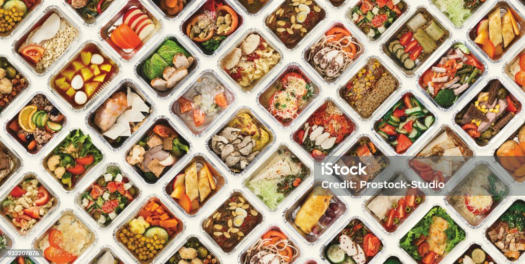 Set of take away food boxes at white background Collection of take away foil boxes with healthy food. Set of containers with everyday meals - meat, vegetables and law fat snacks on white background, top view Food Stock Photo
