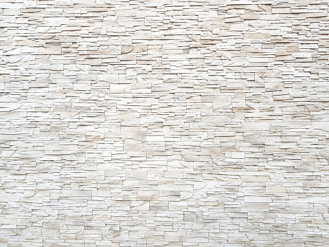 Sandstone brick wall texture and background