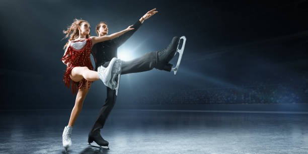 istock Figure skating. Ice skaters couple 932241628